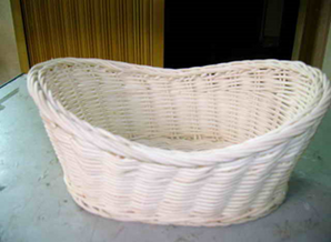 "OVAL RATTAN BASKET, DIM: 23x17xH10/7CM." - Mabrook Hotel Supplies